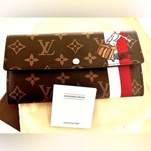 Authentic Louis Vuitton Monogram Bellboy Groom Sarah Wallet. Brand New.